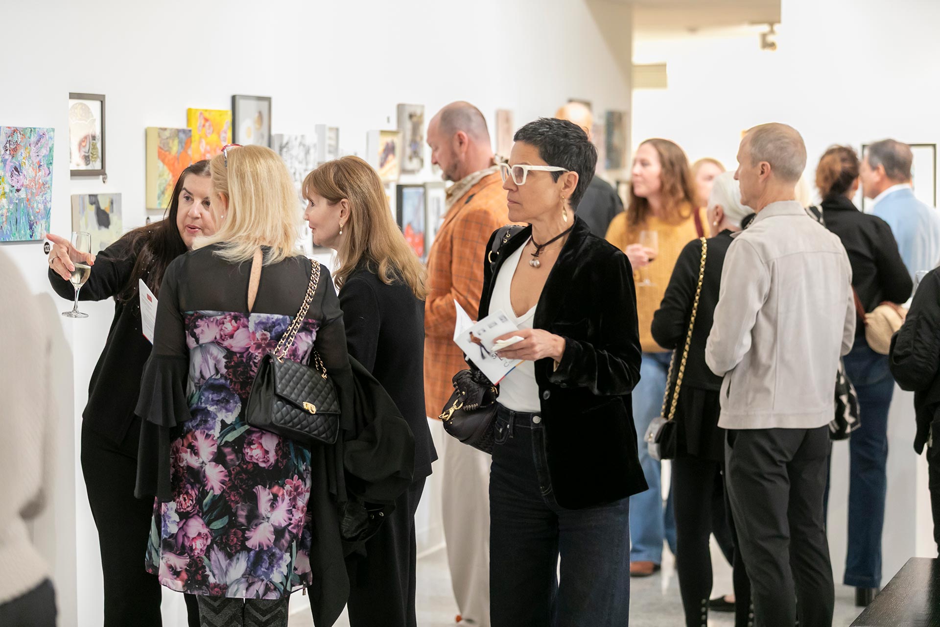 Guests viewing artwork at the Cultural Council